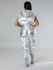 Rear view of women's metallic silver hooded puffer vest and gathered joggers set