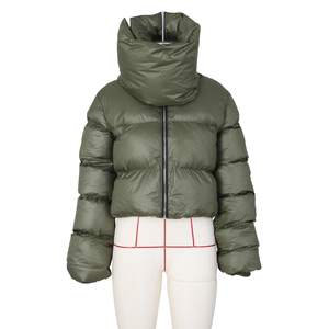 Detailed view of olive green puffer jacket with oversized wrap collar and zipper closure