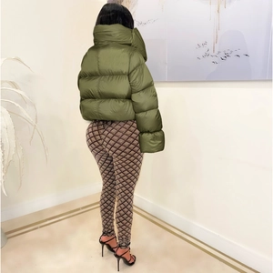 Back view of shiny olive green puffer jacket with high collar and quilted waterproof fabric