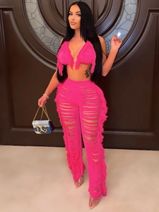 Neonpinkes Strick-Zweiteiler-Set mit Neckholder-Top und weit geschnittener Fransen-Hose