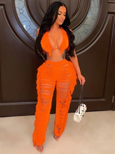 Sexy oranges Strick-Zweiteiler mit Neckholder-Top und ausgehöhlter Quasten-Hose für Damen