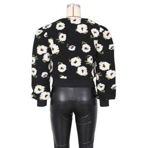 Back view of a black cardigan jacket featuring detailed white 3D floral embroidery