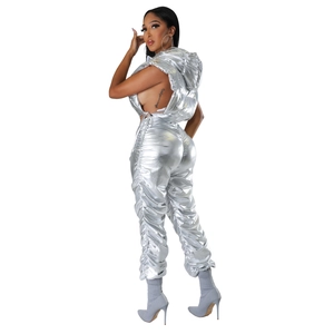 Detail of silver metallic sleeveless hoodie with cutout sides and ruched joggers
