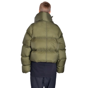 Rear view of an oversized military green puffer jacket with a high collar and quilted texture