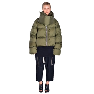 Detail of olive green puffer jacket with unique oversized high-neck wrap collar design