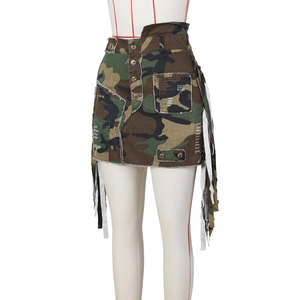 Detail of camouflage mini skirt with button front, frayed hem and side fringe tassels