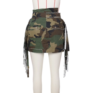 Detail of high-waisted camo mini skirt featuring frayed fringe trim and cargo flap pockets