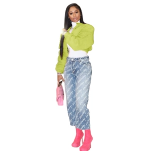Detail of neon green cropped faux fur jacket with soft plush texture for women