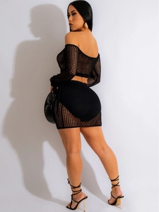 Women's black knit crochet two-piece beach set with long sleeve crop top and mini skirt