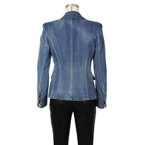 Rear view of slim fit dark blue denim blazer with structured shoulders and gold buttons