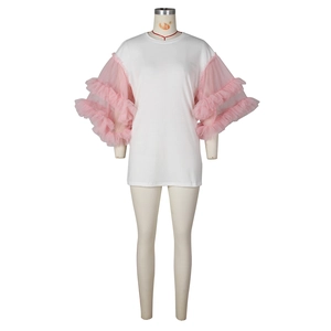Detail of multi-layered pink mesh ruffle sleeves on a white casual cotton T-shirt dress