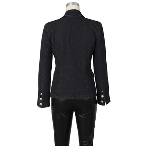 Back view of slim-fit black denim blazer featuring structured seams and gold embossed buttons