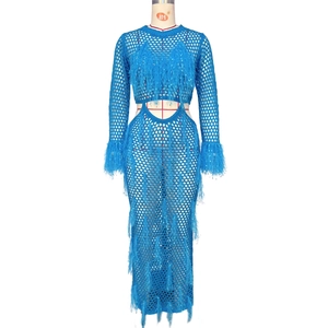 Detail of blue crochet knit two-piece set with mesh texture and long fringe feathers