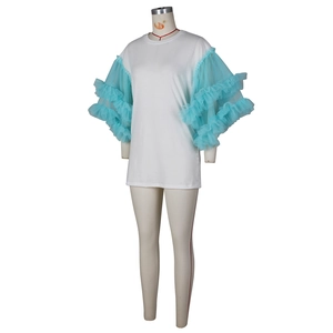 Detail of white cotton T-shirt featuring layered light blue mesh tulle ruffle sleeves
