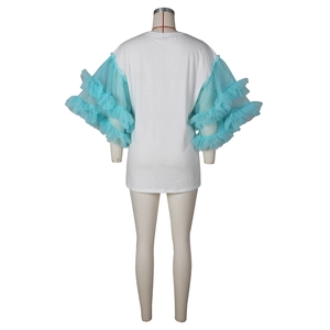 Close-up of fluffy multi-layered blue mesh tulle sleeves on a casual white T-shirt dress
