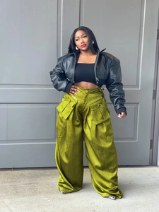 Women's green high-waisted cargo wide-leg pants with detachable pockets and satin finish