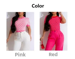 Detail view of heart-patterned knitted short sleeve tops in pink and red color contrast