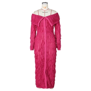 Detail view of the rose red off-shoulder dress with ruffle trim and pleated texture