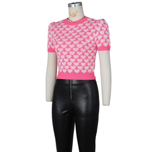 Detailed view of pink and white heart knit short sleeve top with round neck for women