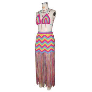 Detail of handmade crochet bikini set with wave pattern and long fringe tassels