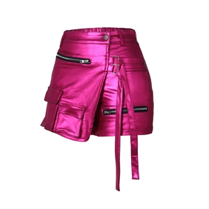 Detail of metallic rose red skort with cargo pockets and punk style straps
