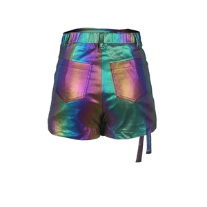 Detail showing high-waisted iridescent metallic cargo shorts with pockets and decorative straps