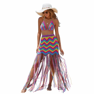 Detail of colorful chevron crochet knit beach set featuring long bohemian fringe tassels