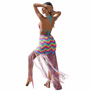 Detail of handmade crochet bikini set with colorful wave patterns and long tassels