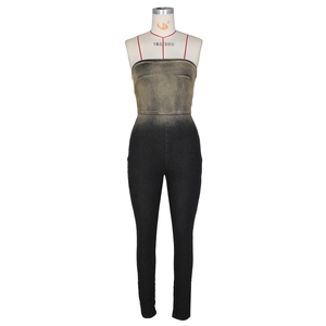 Detailed close-up of ombré strapless jumpsuit showing distressed gold and black texture