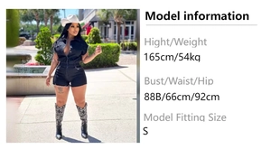 Detailed size chart overlay on black denim romper with embroidered cowboy boots