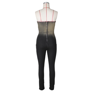 Detail of back metal zipper on a black gradient denim slim-fit bodysuit with red straps