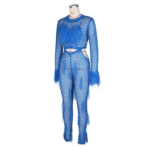 Detail of royal blue crochet knit set featuring elegant feather tassels and openwork mesh