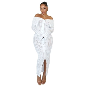 Detail of off-shoulder white midi dress with vertical ruffle texture and button front