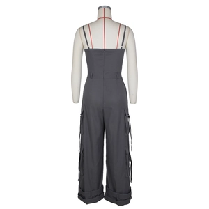 Close-up of the back zipper and cargo pockets on dark gray strapless jumpsuits