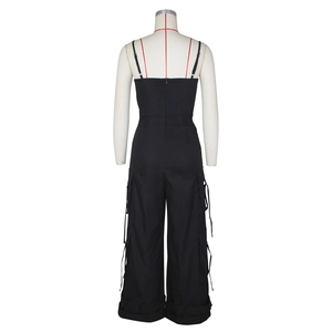 Back view of black strapless cargo jumpsuit featuring large utility pockets and straps