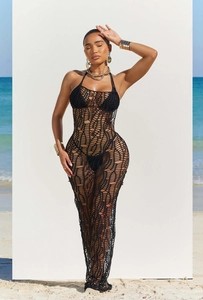 Texture dettagliata del copricostume nero all'uncinetto per vacanze in spiaggia e mare