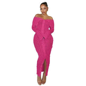 Detail of rose pink ribbed knit dress with off-the-shoulder neckline and button decor