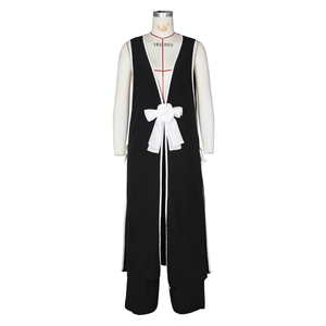 Detail of black vest set featuring a large white bow and a 3D camellia flower accent