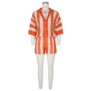 Detail of orange and white striped crochet knit set with short sleeve cardigan and shorts
