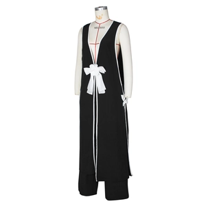 Detail of black V-neck sleeveless tunic with white floral bow and wide leg trousers