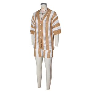 Detail of crochet knit two-piece set with brown and white stripes and button closure