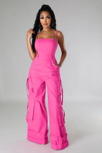 Detailed view of cargo jumpsuit with functional pockets and stylish utility straps
