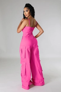 Detailed view of cargo jumpsuit with multi-pocket design and wide-leg silhouette