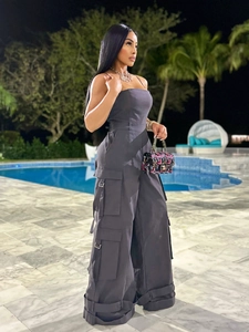 Sleeveless cargo jumpsuit with multiple pockets and wide legs in dark gray finish