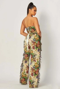 Detailed view of back lace-up closure on floral jacquard corset with colorful fringe
