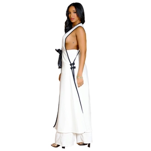 Detail of white sleeveless vest top with black bow accents and high side slit design