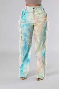 Detail showing high-waisted watercolor print trousers with white fringe on side seams