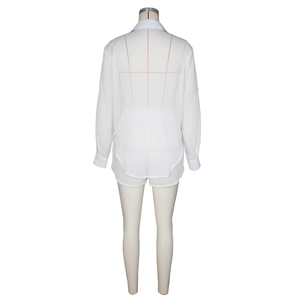 Rear view of white sheer long-sleeve shirt and high-waist shorts set on mannequin