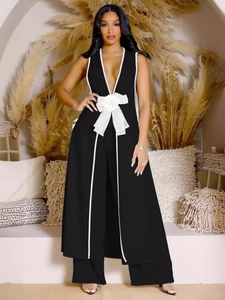 Women's chic black two-piece set with long sleeveless V-neck top and wide-leg trousers