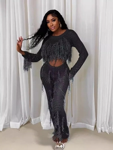 Women's sexy black crochet two-piece set with long fringe tassels and shimmering sequins